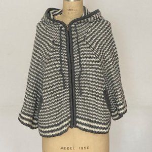 Zip front cape-like hood sweater